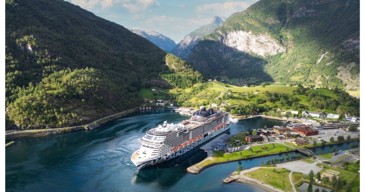 A ship moving through steep northern fjords